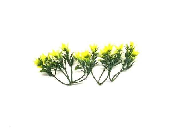 Two-color injection molded plastic leaf with natural color gradient